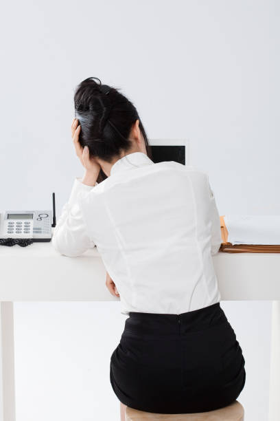 istock back view of woman in suit 1396809064