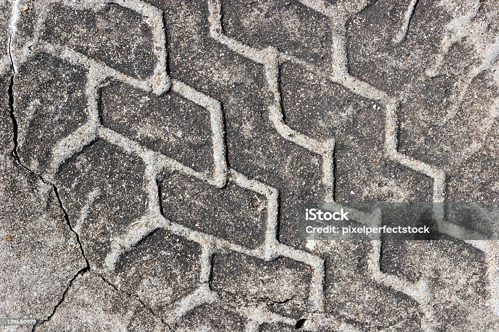 Tire Track Tire track in concrete Arrangement Stock Photo