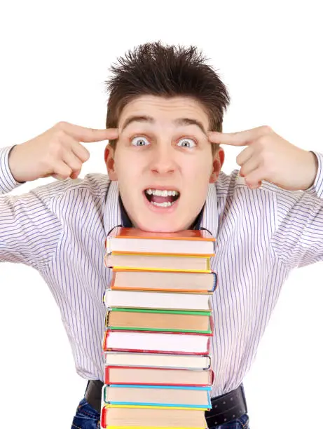 Excited Student with the Books Isolated on the White Background