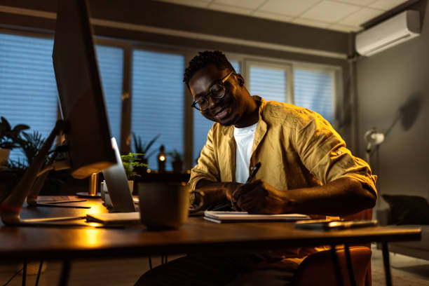 istock Afro american young man working at home office 1396815761