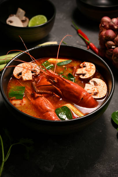 delicious tom yam kung or thai spicy coconut milk soup with shrimps. - sopa tom yum imagens e fotografias de stock