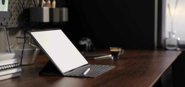 istock Rear view, Modern vintage workspace interior with tablet on dark stylish wood table 1396816003