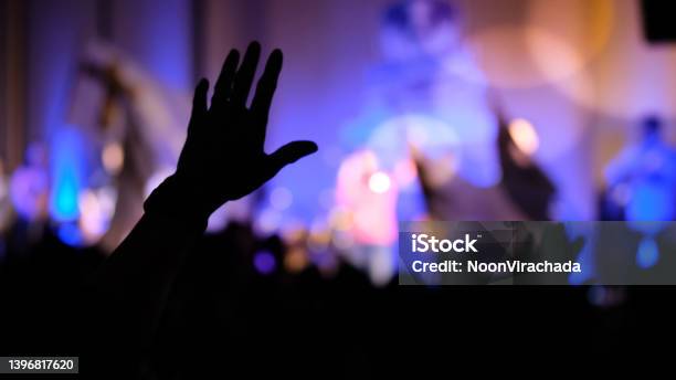 Hand Raising Concert Hand Raising For Religion Stock Photo - Download Image Now - Praising - Religion, Church, Praying