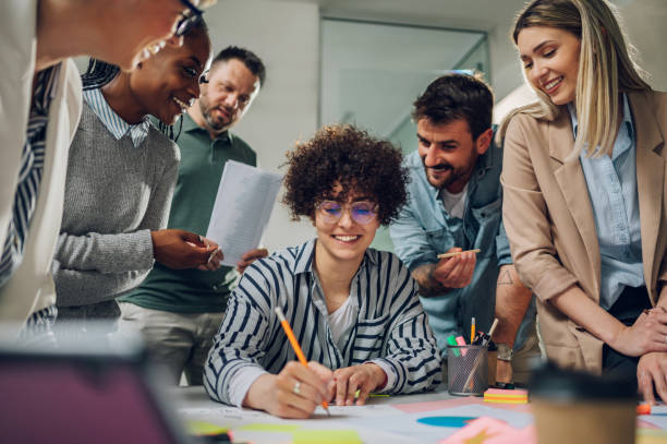 istock Multiracial business team on a meeting in a modern bright office 1396818330