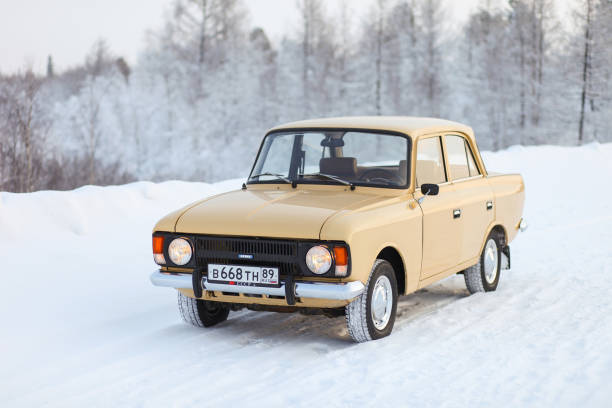 Novyy Urengoy, Russia - February 4, 2022: Soviet classic car Izh Moskvitch 412 in a snowy forest.