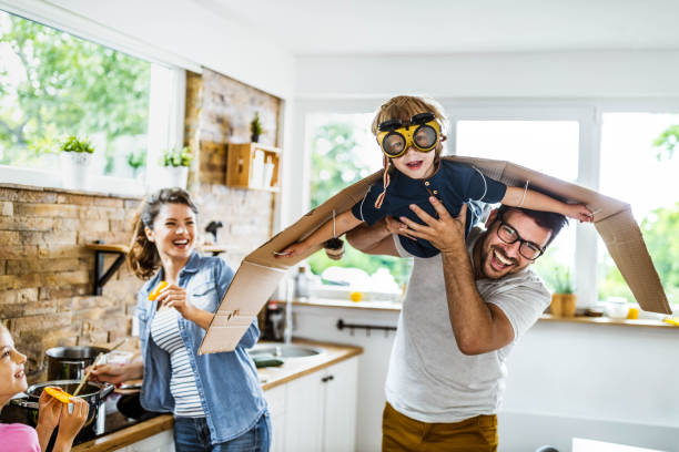 istock Look daddy, I'm an airplane! 1396822404