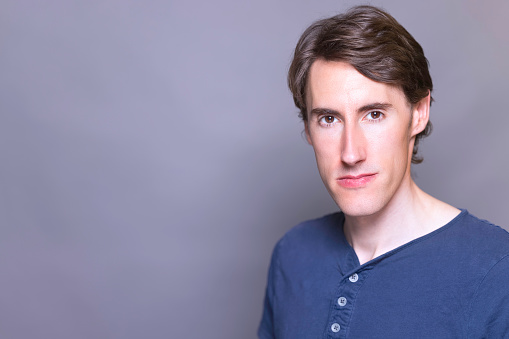 frown young casual man on white background