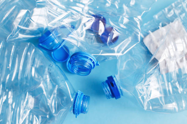 istock a lot of plastic empty rumpled used bottles on a blue background. waste and pollution concept 1396823426