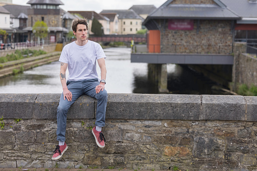 Man waiting for someone in an urban environment.