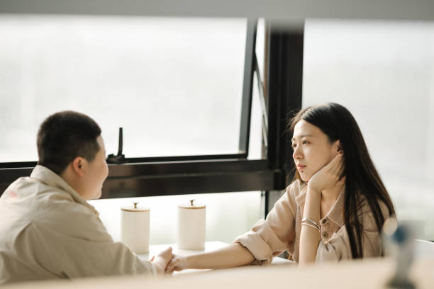 istock Lesbian couples flirt face to face 1396825839