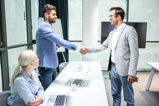 istock Business Meeting Greeting 1396826942