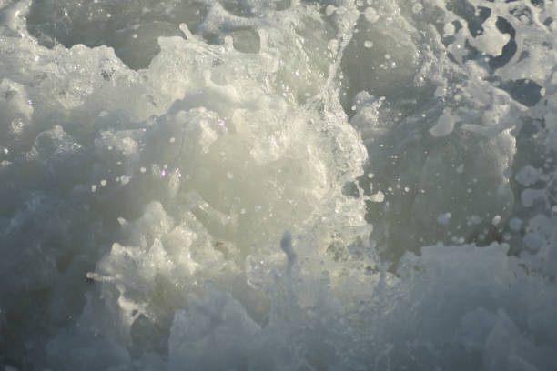 istock Waves sea with white foam entering with force 1396827207