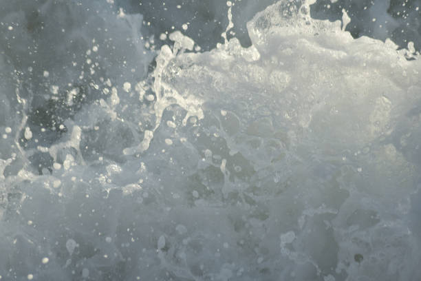 istock Rough waves sea with white foam entering with force 1396827212