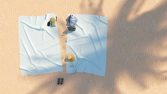 Two towels on the sandy beach under palm tree 3D rendering