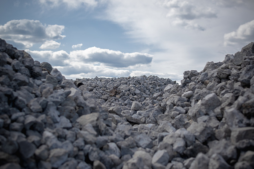 A commercial gravel pit of crushed stone for construction and road works. Gravel extraction.