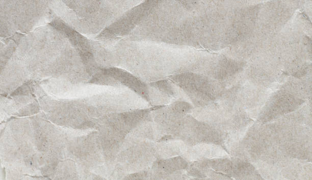 istock Crumpled paper for use as a background or texture. 1396834711