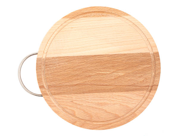 istock Round wooden beech cutting board with handle isolated on white background, top view 1396836099