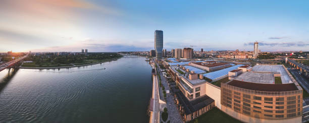 aerial panorama of belgrade waterfront and old town of belgrade, the capital city of serbia by the sava river at sunset. landmark city view. drone point of view. - river sava imagens e fotografias de stock