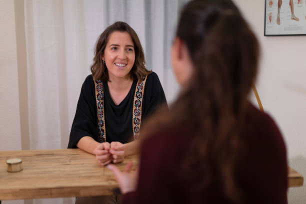 istock A female therapist talking to a client 1396837895