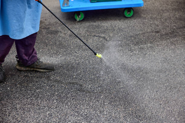 istock Worker spray disinfectant amid COVID-19. 1396838231