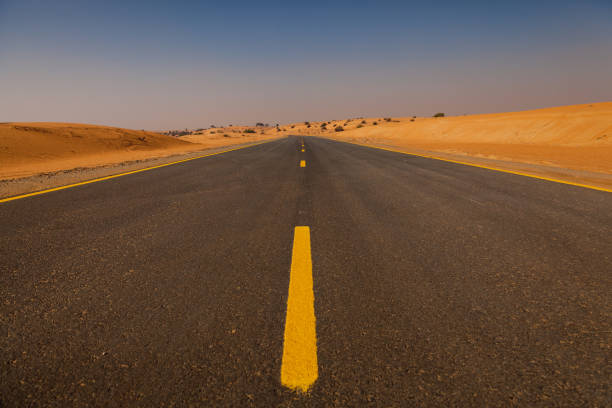 istock Road in the middle of desert 1396841867