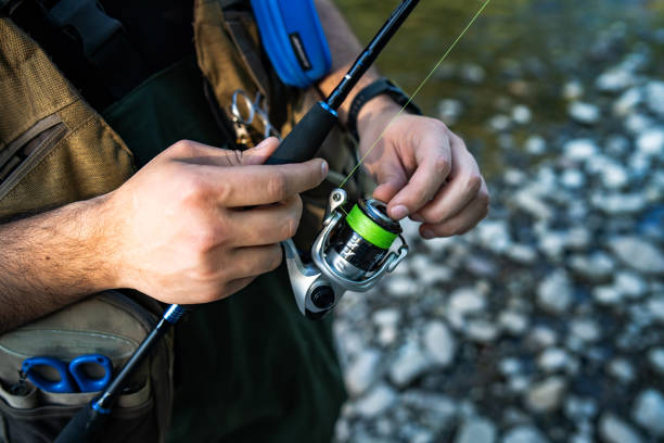 istock Fisherman prepares fishing gear 1396843441