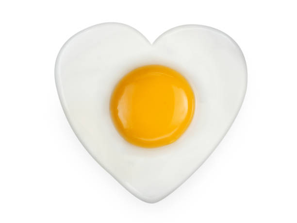 istock Heart-shaped omelet  fried egg isolated on white background1 1396844714