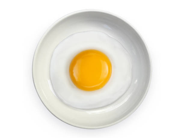 istock Star-shaped omelet  fried egg on ceramic plates isolated on white background 1396845628