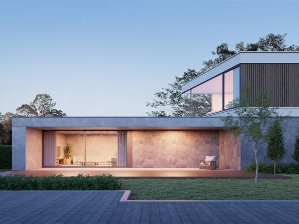 3d-rendering eines modernen luxushauses mit rasengarten und betonboden. - house residential structure luxury night stock-fotos und bilder
