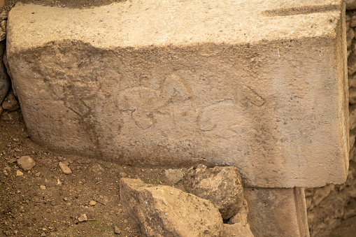 The wall on which Epictetus' A Poem on the Free Man is written. The poetry on the temples, temples and rock inscriptions belonging to the Byzantine period.Smashed, broken, destroyed, historical artifact rock inscription.Written Canyon region.The canyon takes its name from an ancient text carved into a rock inside.