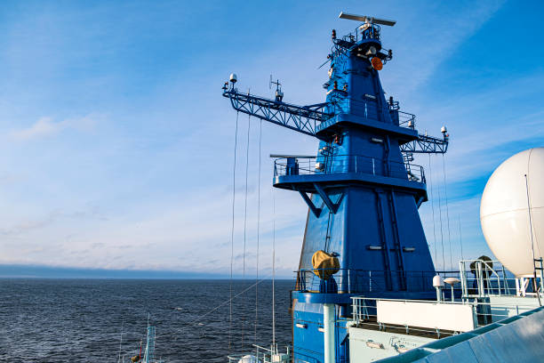 istock Ships antenna and navigation system in a clear blue sky. 1396855639