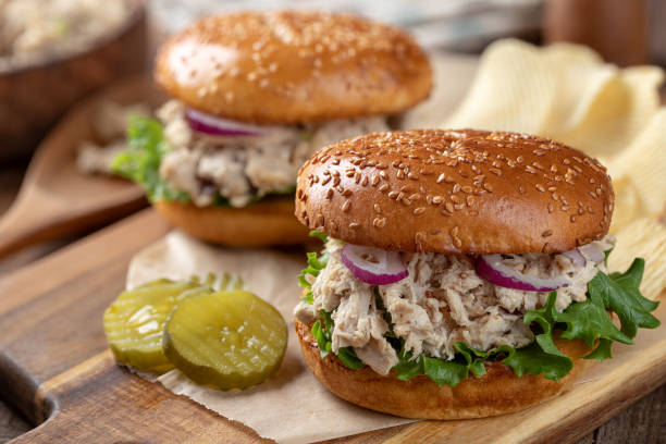 istock Tuna salad and lettuce sandwich on sesame seed bun 1396857185
