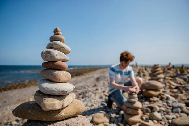 490+ Man Stacking Rocks Stock Photos, Pictures & Royalty-Free Images -  iStock