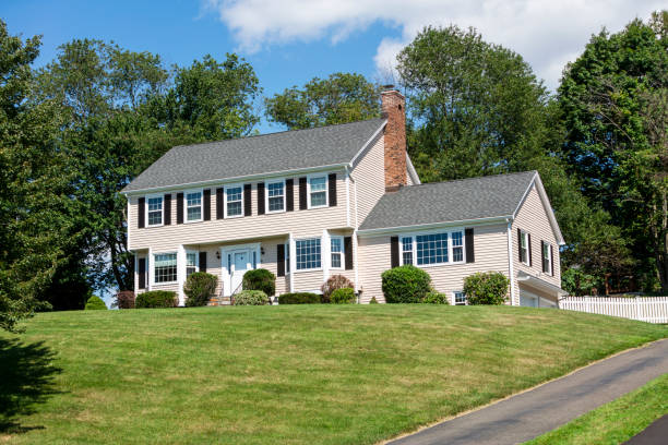 American traditional Colonial house American traditional Colonial house front view in summer colonial stock pictures, royalty-free photos & images