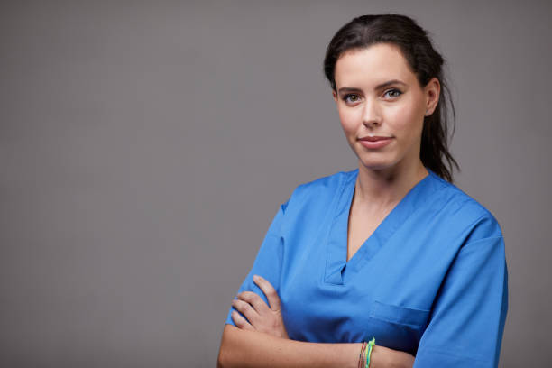 istock A nurse portrait in blue scrubs. 1396861215