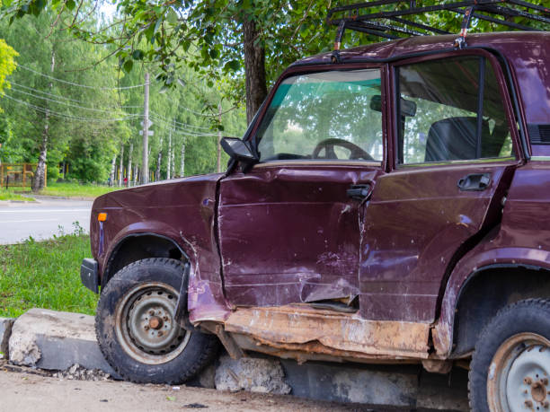 istock Abandoned after the accident, a purple passenger sedan. 1396861498
