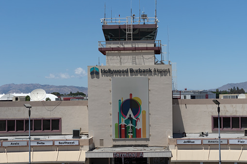 Burbank, California, USA - May 11, 2022: image of the Hollywood Burbank Airport shown on a sunny day with blue sky.