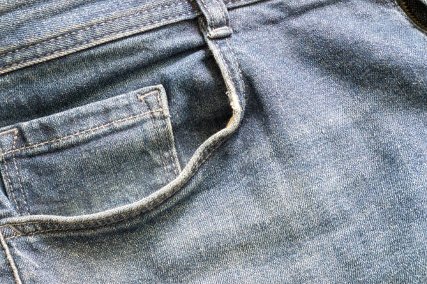 istock abstract background with close-up of jeans pocket 1396863679