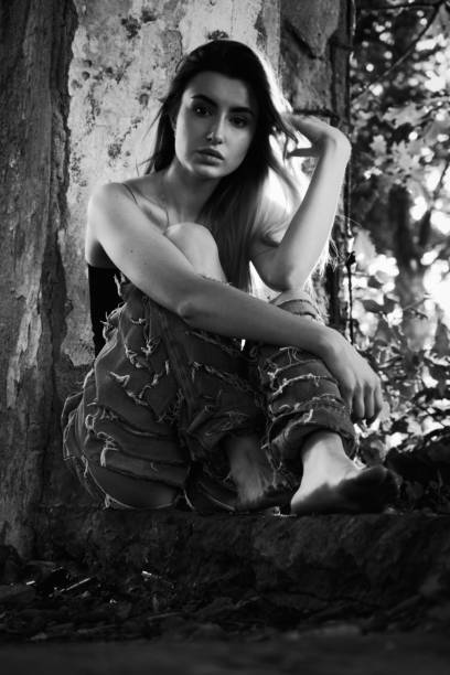 istock tramp girl sitting 1396864466