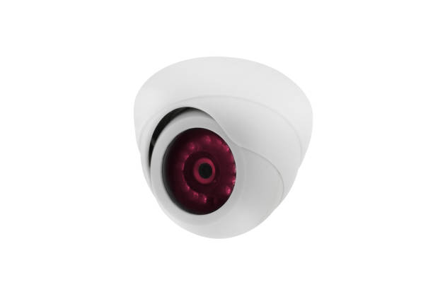 istock Modern public CCTV camera on wall isolated on white background. Intelligent reccording cameras for monitoring all day and night. Concept of surveillance and monitoring with clipping path copy space. 1396869403