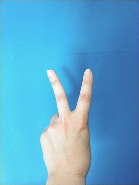 istock victory sign with the hand 1396871504