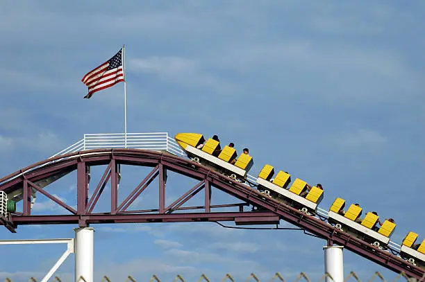 American flag at the top of a rollercoaster in California.