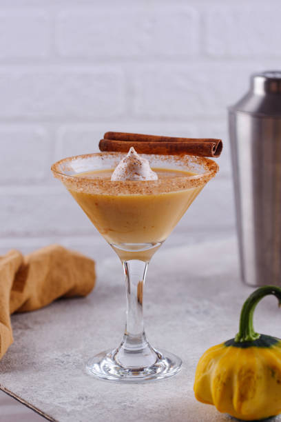 Creamy pumpkin martini cocktail or liquor stock photo