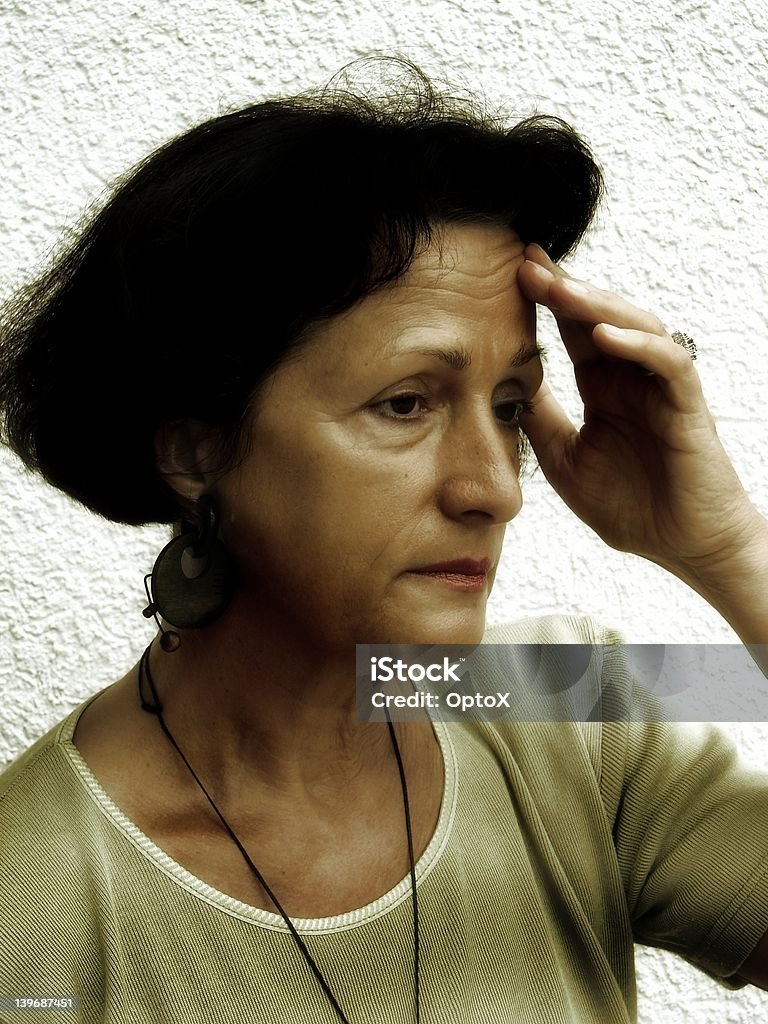 Headache Woman looking ill and tired Adult Stock Photo