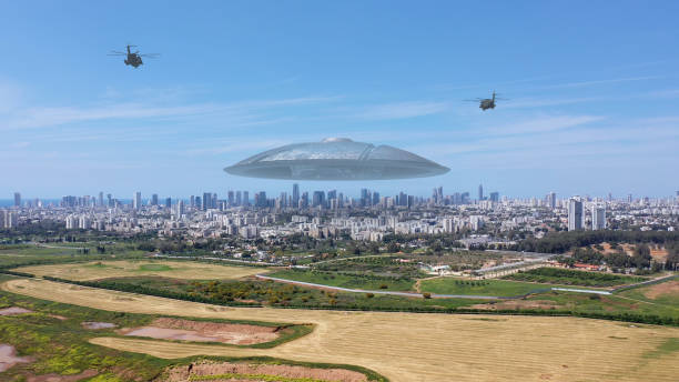 istock 3d rendering, Massive ufo Flying saucer hovering over large city Aerial view 1396874526