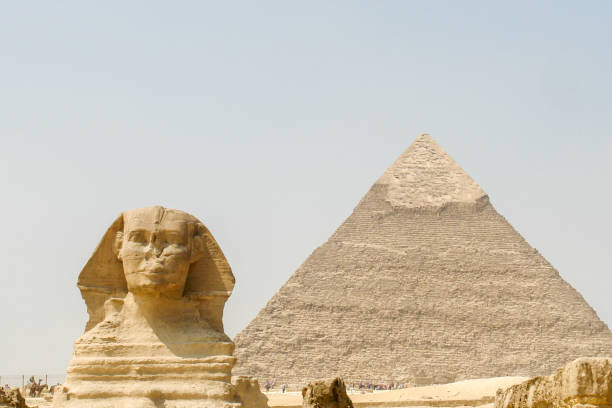 istock Sphinx in front of pyramids, Giza, Cairo, Egypt 1396875523