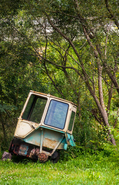 istock cab of old wrecked tractor 1396876854