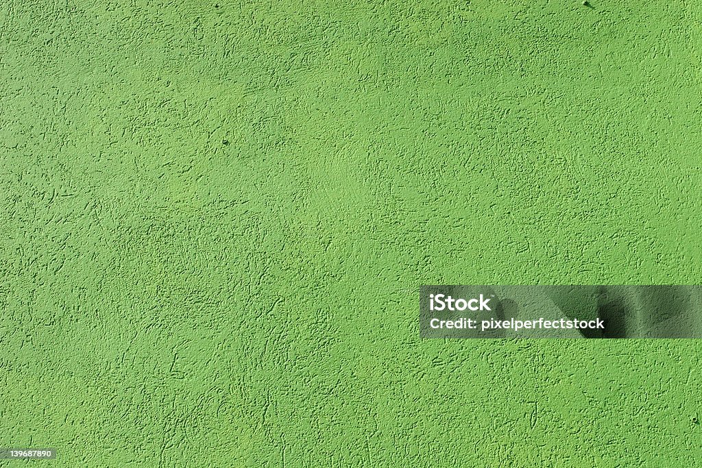 Green Stucco Closeup of green stucco wall. Cement Stock Photo
