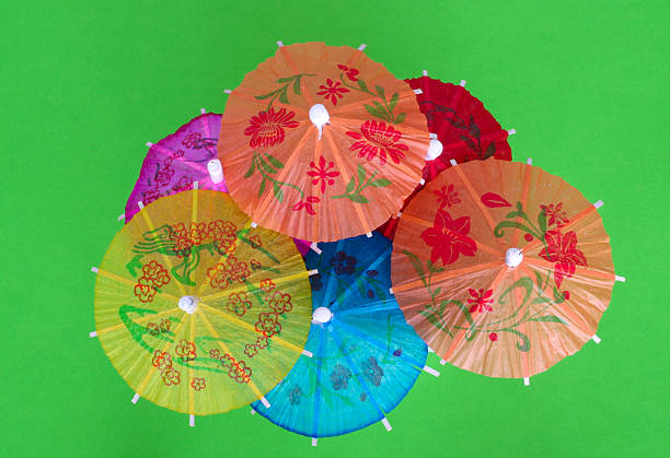 asiatische cocktail sonnenschirme - drink umbrella umbrella parasol small group of objects stock-fotos und bilder