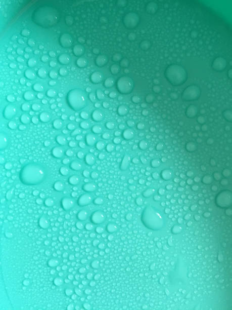 istock Water drops on the green background 1396882507